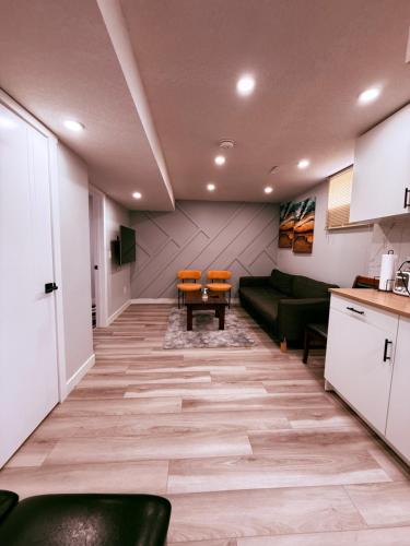 Southeast Calgary House | Spacious 2 bedroom with 2 queen beds and one sofa bed lower unit with separate entrance and parking space Near Downtown, Calgary Zoo, Costco and many more