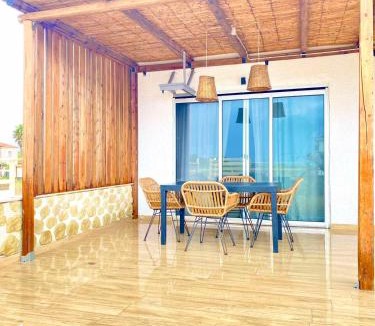 Messini House | Boho Natural Beachfront Detached House