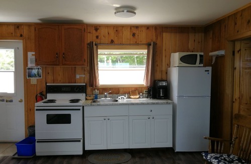 Ingonish Beach Hotel | Knotty Pine Cottages