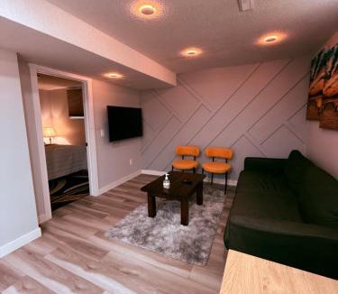 Southeast Calgary House | Spacious 2 bedroom with 2 queen beds and one sofa bed lower unit with separate entrance and parking space Near Downtown, Calgary Zoo, Costco and many more