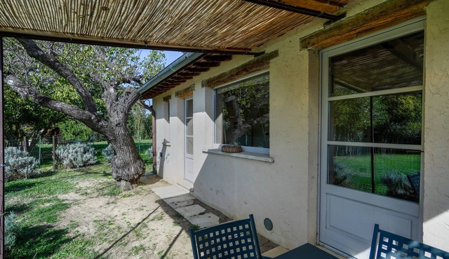 Comfortable apartment in Asciano, A/C,Wi-Fi, ground floor with garden