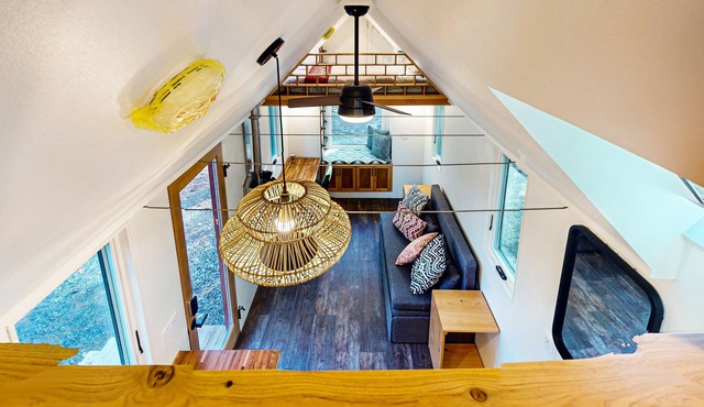 Lovingly crafted tiny home with wood stove, grill, & serene views