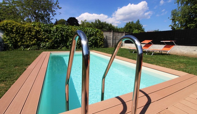 Overlooking Lake Orta. Plenty of room, private garden with pool