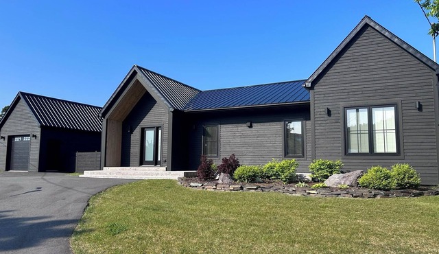 Spacious waterfront property next to Golf course and walking trails.