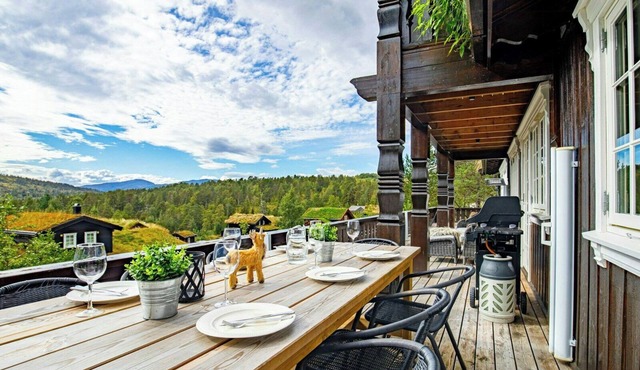Traditional cabin with turf roof near Stryn