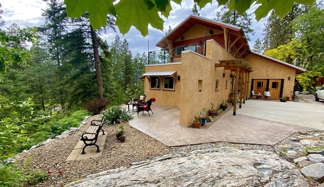 Unique riverside chalet with 1 acre of private forest