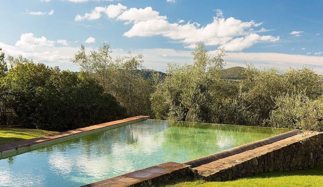 Villa Al Bosco: An elegant and welcoming three-story villa situated in a secluded location surrounded by meadows and by green hills, with Free WI-FI.